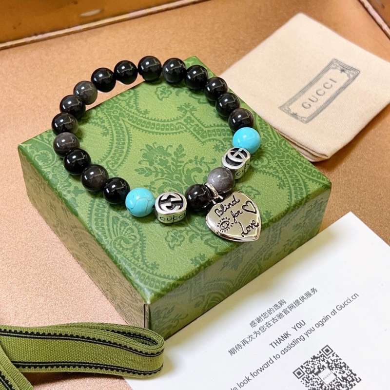 G*u*i bracelets